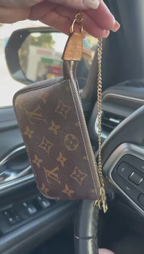 SMALL PURSE L. V.